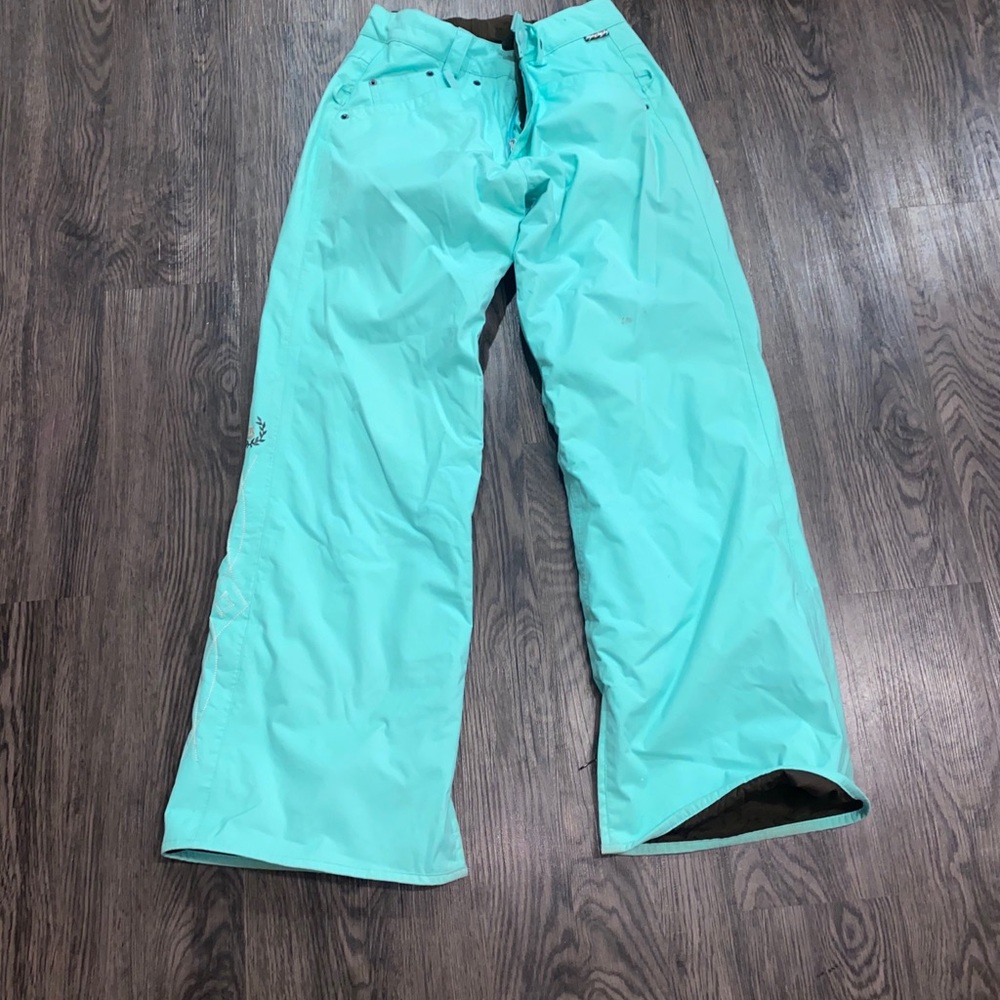Burton teal women’s snowboard pants size small.